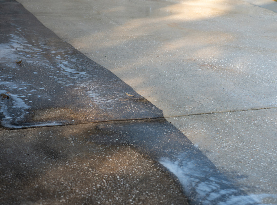 A half clean and half dirty driveway